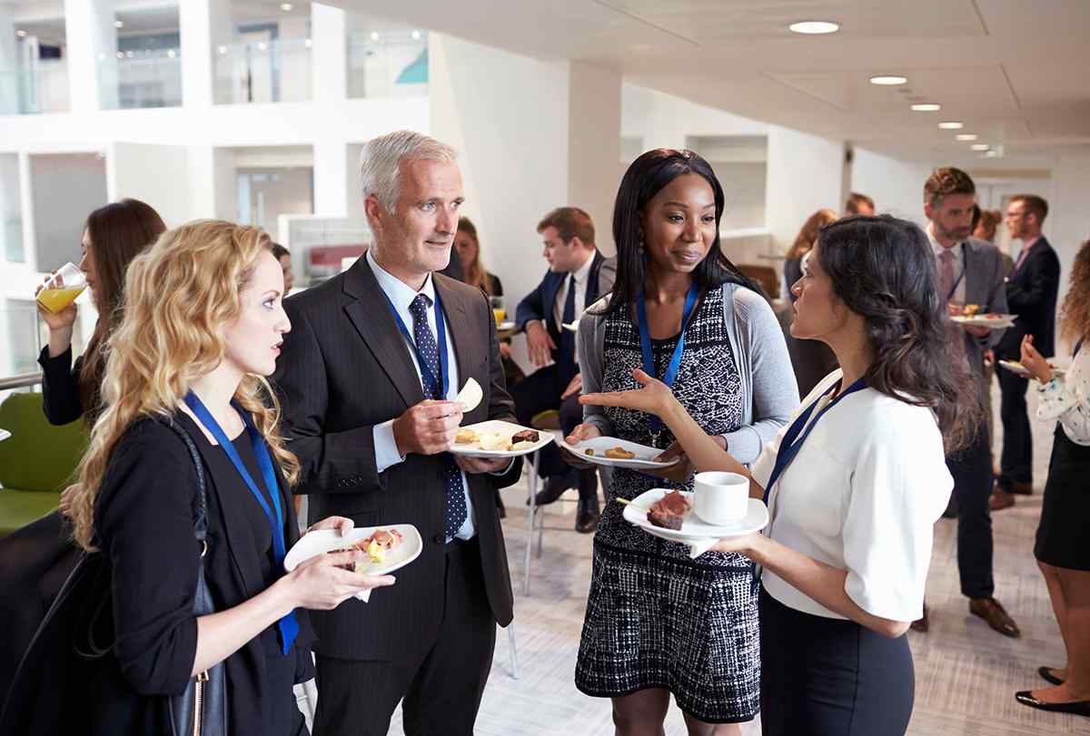 Diverse senior business people in an informal company meeting discussing new business decisions based on Ideal Customer Profile (ICP) data