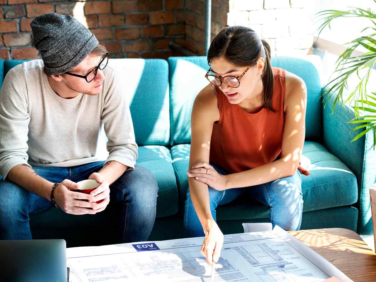 Colleagues discussing offline growth strategies for their startup