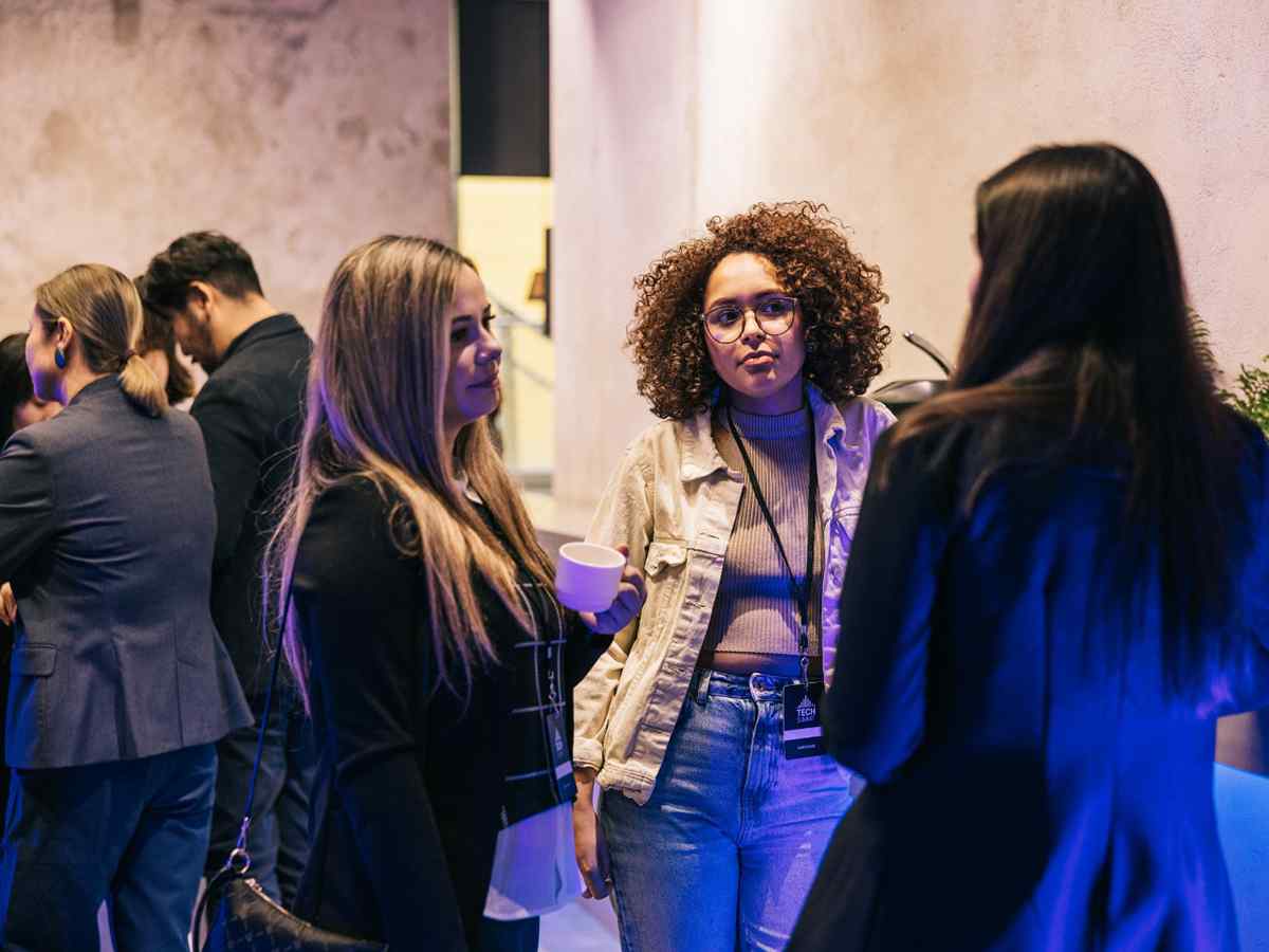 Diverse group of founders networking at a business event